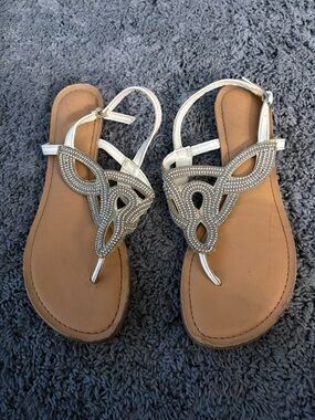 Lightly worn Fergie brand strappy through the toe sandals with a cute thick top